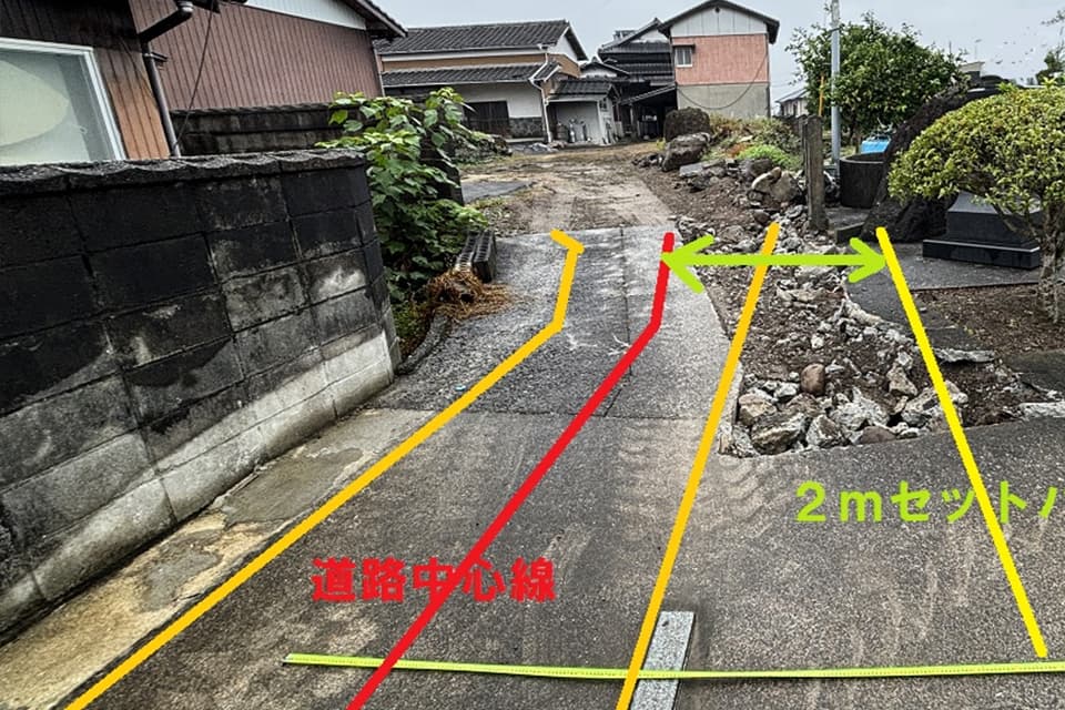 石の撤去と道路幅員の確保を計画
